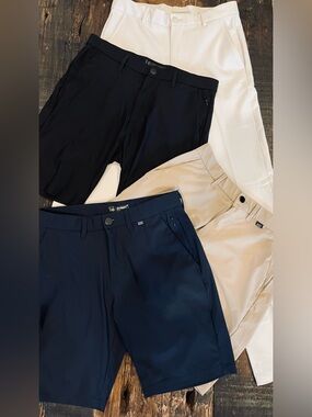 GREG NORMAN Men's Stretch Chino Pants WITH Mixed Brand Trio Shorts Golfer Bundle